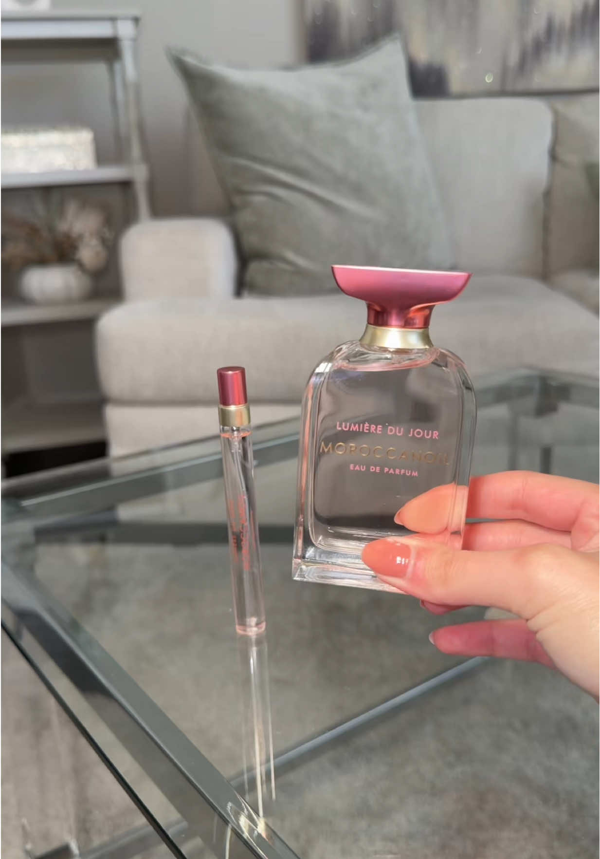 TikTok post by @psychictexas for Moroccanoil. Caption reads: The new Moroccanoil perfume is perfect for [...].