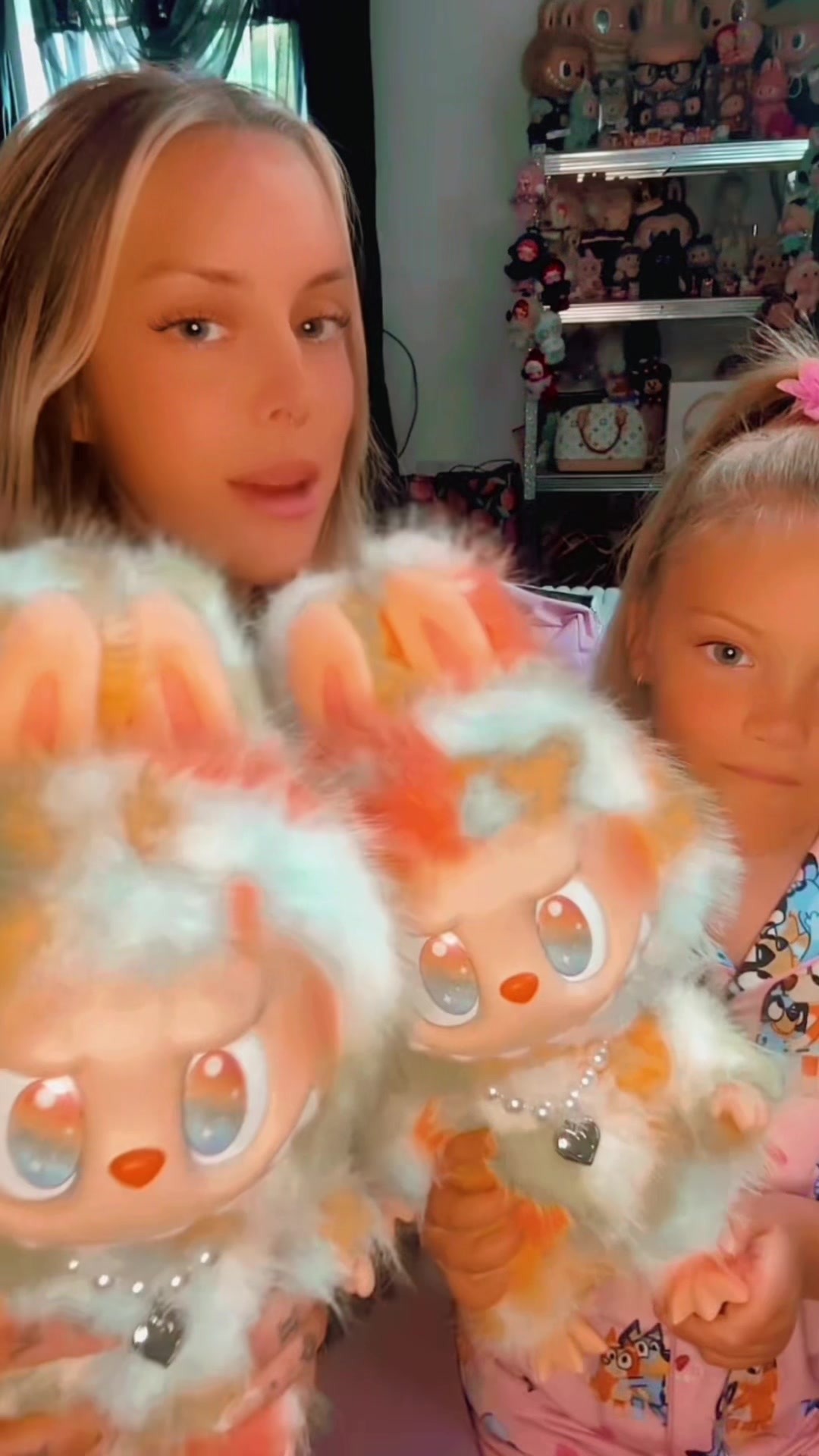 TikTok post by @itskerrinx for POP MART. Caption reads: 🩷🩵🧡💛 SPECIAL UNBOXING!! ROCK THE UNIVERSE IS....