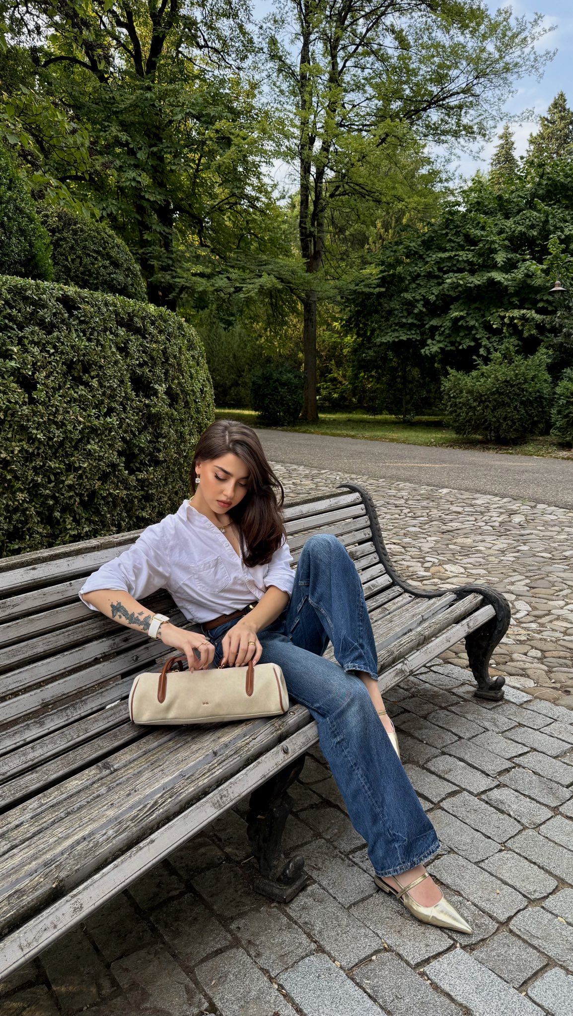 Instagram post by @_nazijavakhishvili_ for Sojo Svision. Caption reads: 🤎🤎🤎🤎🤎

Bag @jwpei_official 

Glasses....