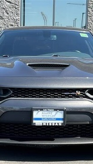 Instagram post by @thekingburrusmma for Dodge. Caption reads: Straight out the dealership 🥶🧊 @dodgeofficial....