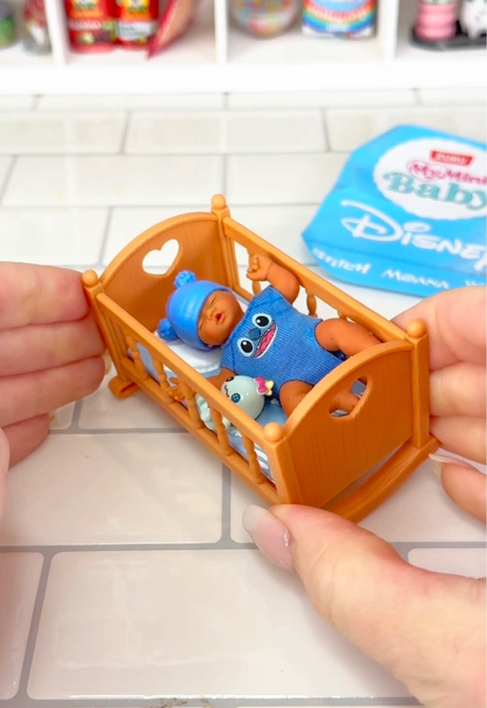 TikTok post by @chloesminicuties for ZURU Toys. Caption reads: Eeek RUN! You can get the @ZURU Toys Disney My....