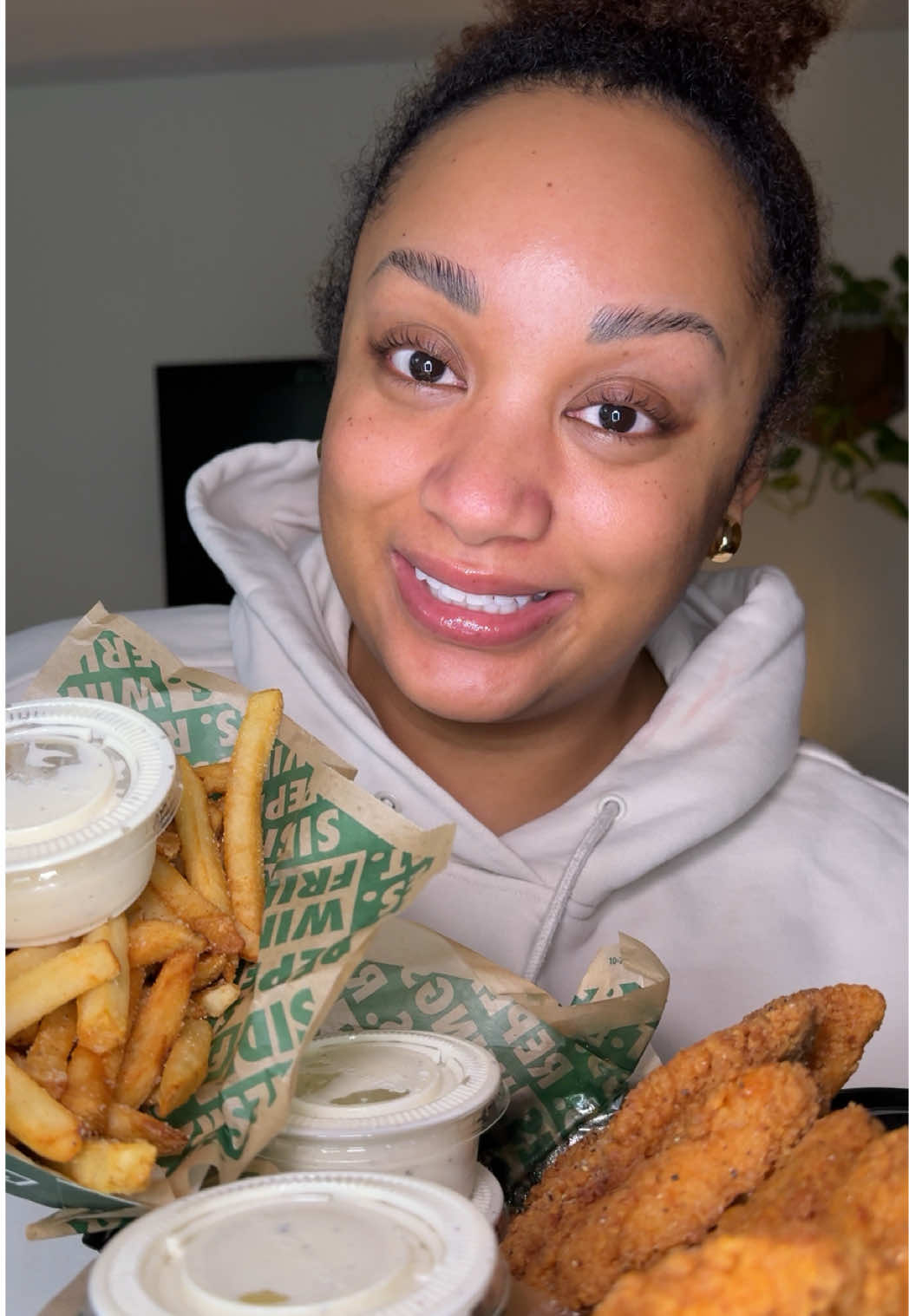 TikTok post by @marandasmukbangs for Wingstop. Caption reads: Hi Foodies! Let’s eat @Wingstop 🍗🍟 I loveeeee....