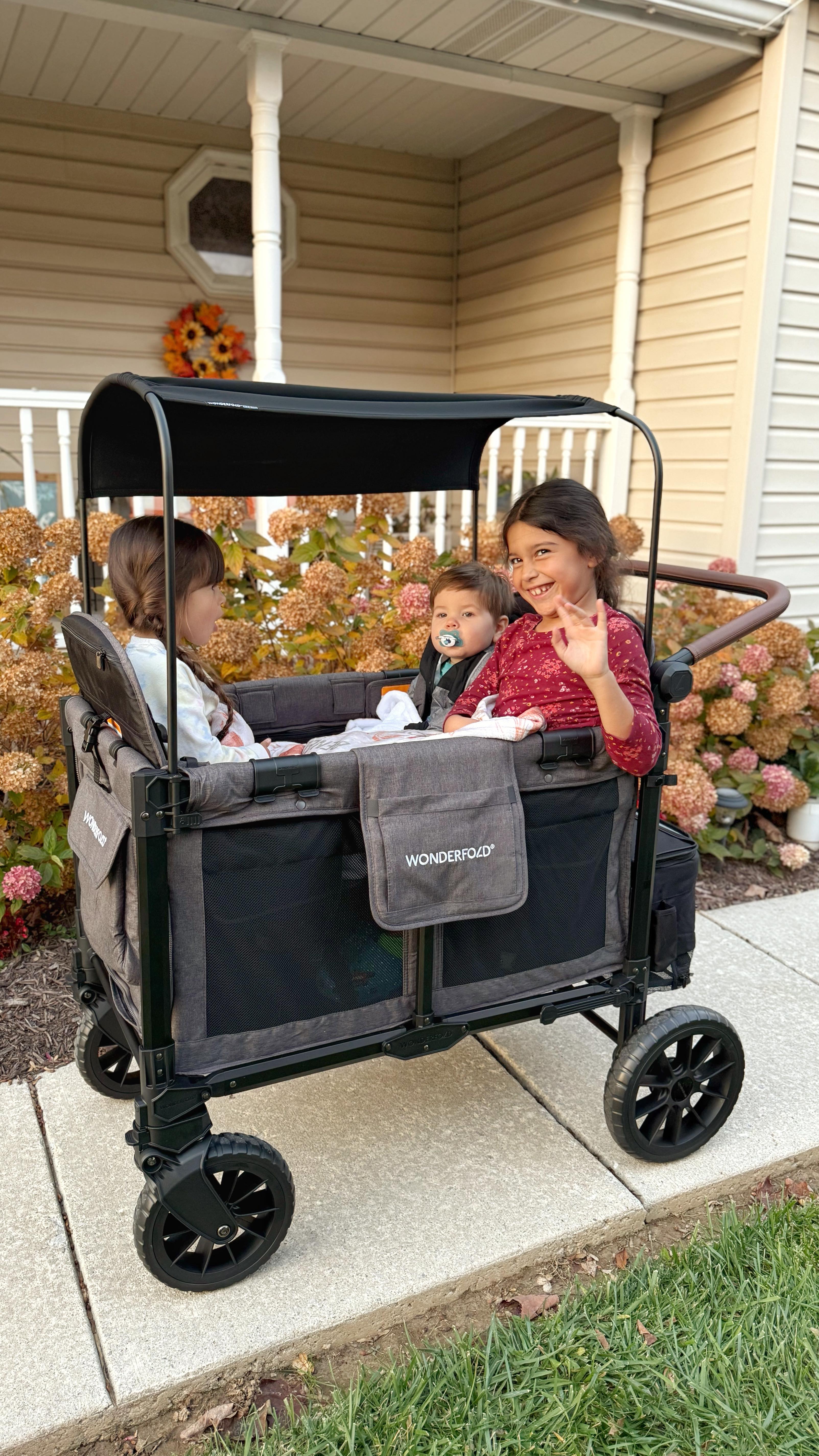 Instagram post by @sarahjaynexplores for WonderFold. Caption reads: Okay parents — if you’ve been eyeing a WonderFold,....