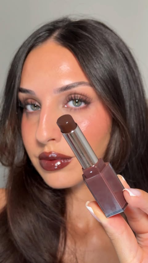 Instagram post by @naomimizrahi for LOOKFANTASTIC. Caption reads: [...] bomb stix “Sweet whisky” Shop at....