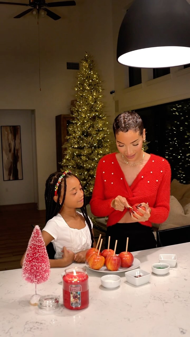 Instagram post by @ravenelyse for Yankee Candle. Caption reads: #ad 🍎🎄Teacher Gift Idea! We made festive candy....