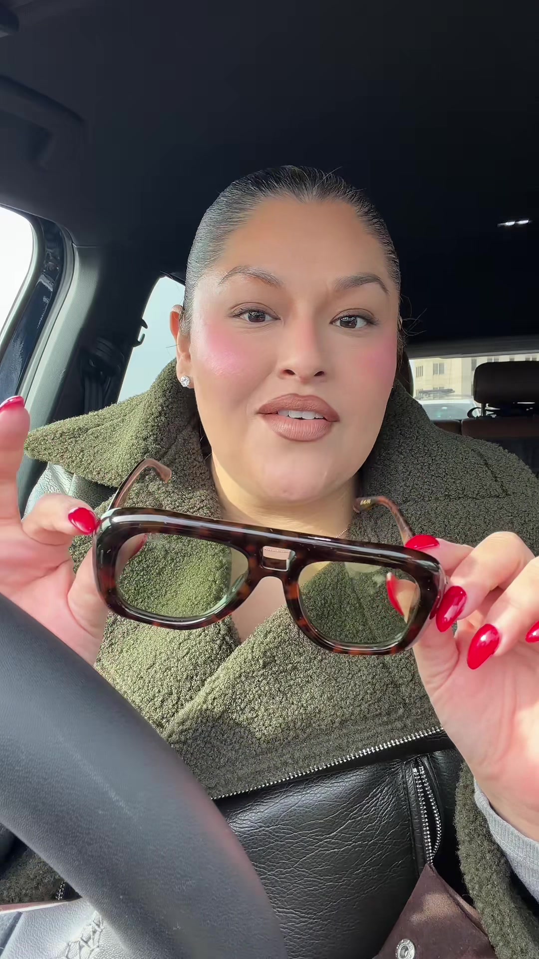 TikTok post by @amandanieves10 for DEZI. Caption reads: You can always catch me in my @DEZI EYEWEAR pusha....