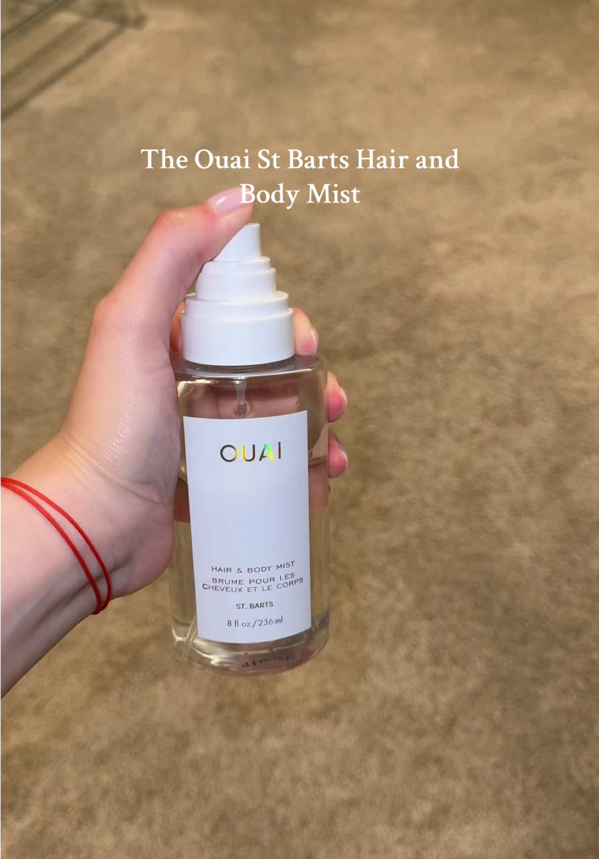 TikTok post by @psychictexas for OUAI. Caption reads: [...] mist for summer 🌊☀️🤌 @THE OUAI #fyp....