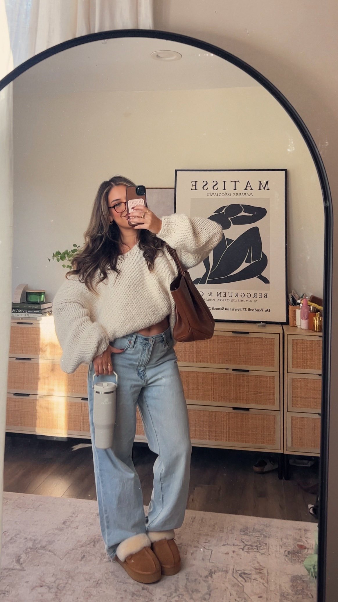 Instagram post by @daniellee_esther for Stanley 1913. Caption reads: Morning rituals, cozy neutrals, and the perfect....