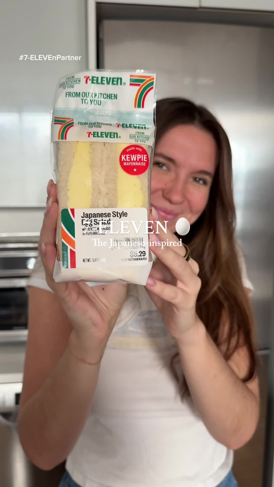 TikTok post by @kaitlyneats for 7-Eleven. Caption reads: It’s here!!! @7-ELEVEn Japanese-inspired egg salad....