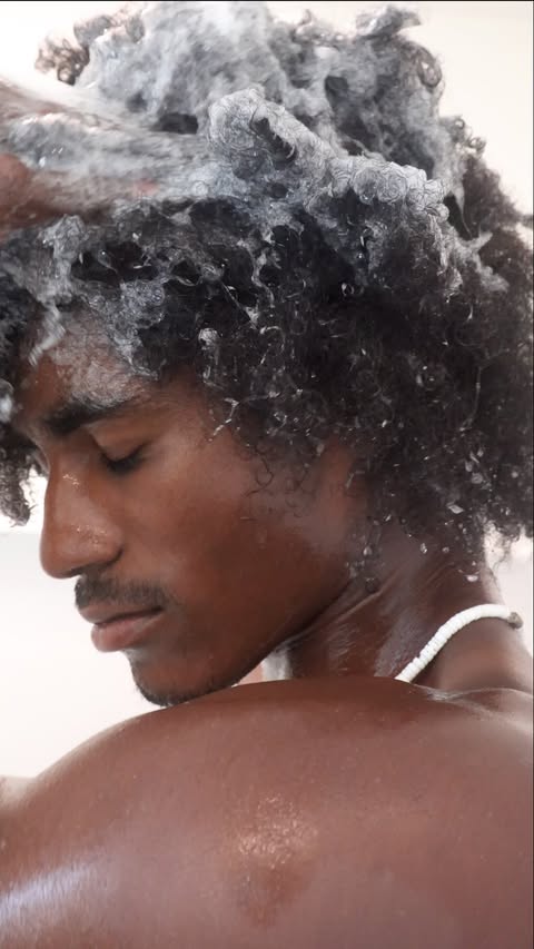 Instagram post by @ahmed_reynolds_ for Camille Rose. Caption reads: 3-Step Afro Washday with @camillerosenaturals all....