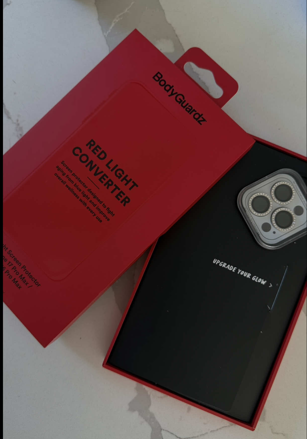 TikTok post by @daniellelpeterson for Bodyguardz. Caption reads: [...] screen for my new phone say lesssss....