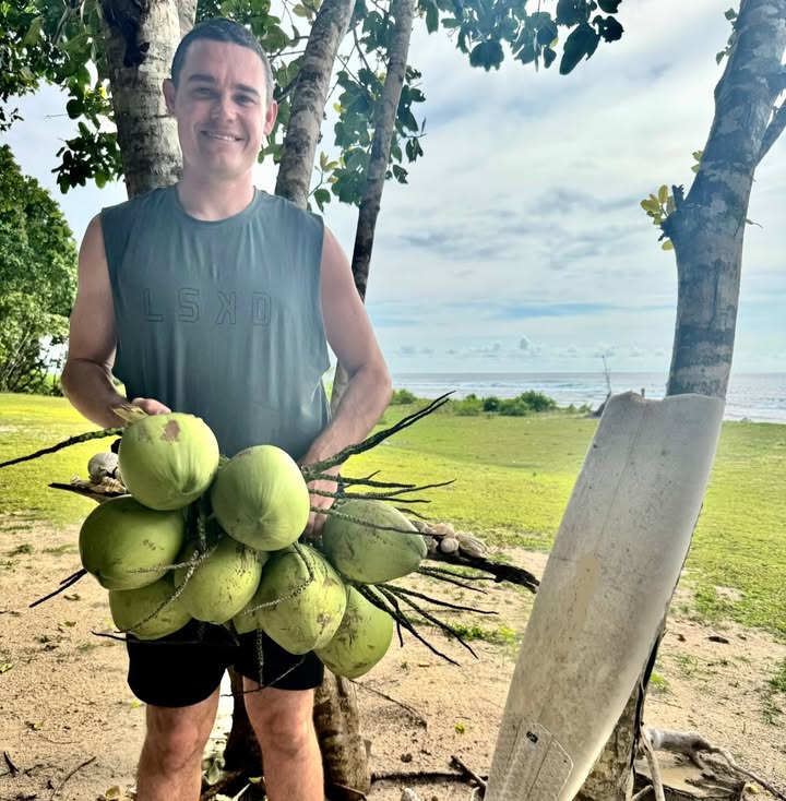 Instagram post by @samh_snaps for LSKD. Caption reads: [...] down some coconuts, then surf again! 🥥@lskd....