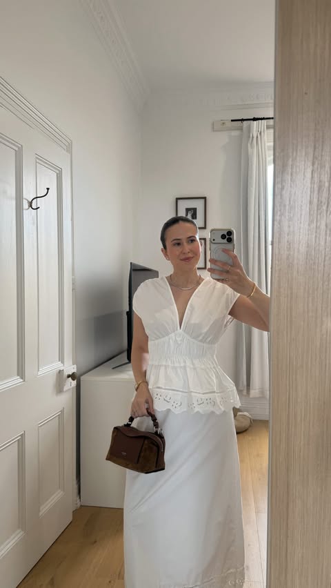 Instagram post by @paigekennedy for THE ICONIC. Caption reads: [...] #springstyle #whiteskirt #maxiskirt....