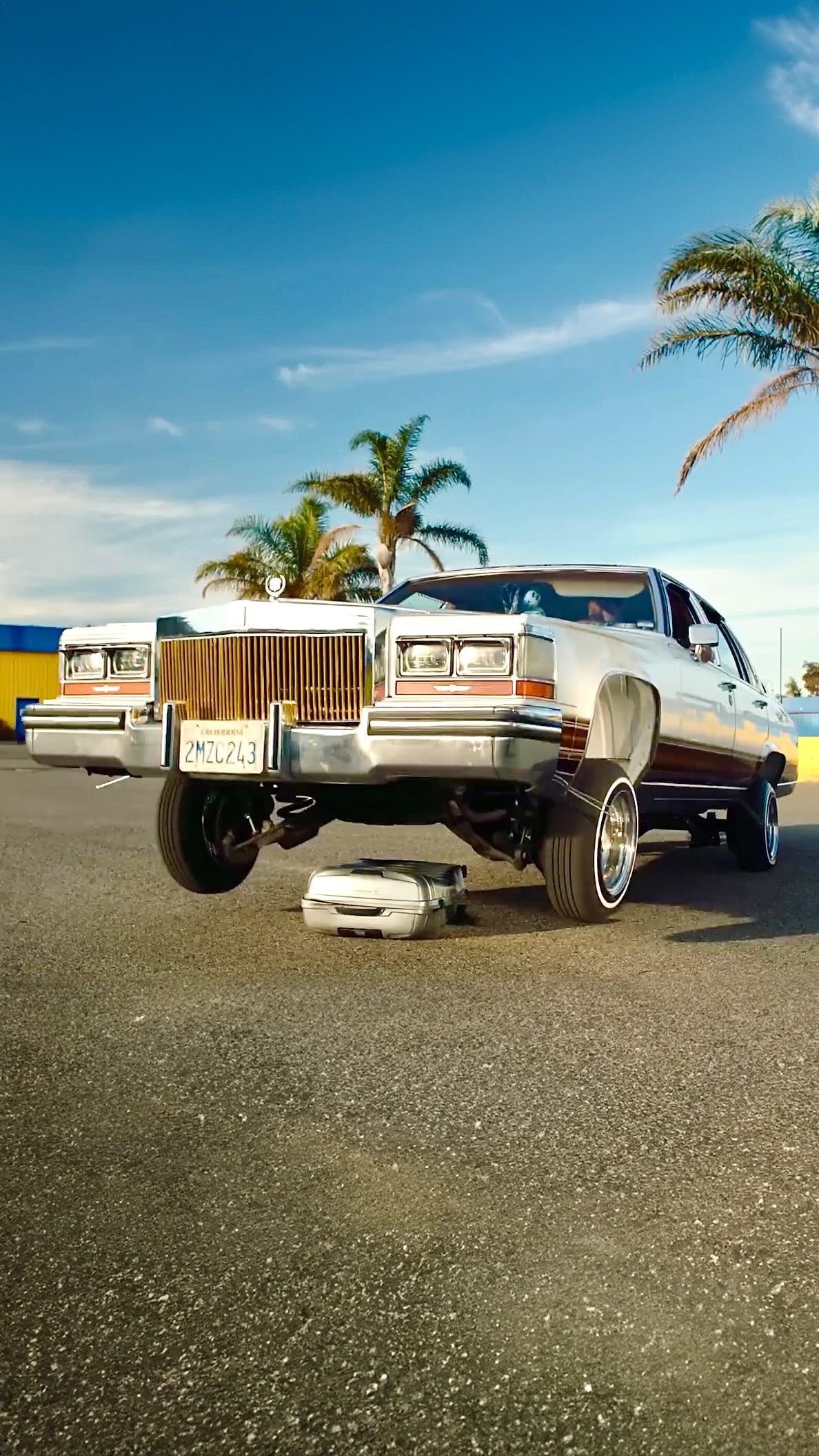 Instagram post by @_lowriderfilms for SAMSONITE. Caption reads: Samsonite vs The Lowrider (2025) Cadi smacking....