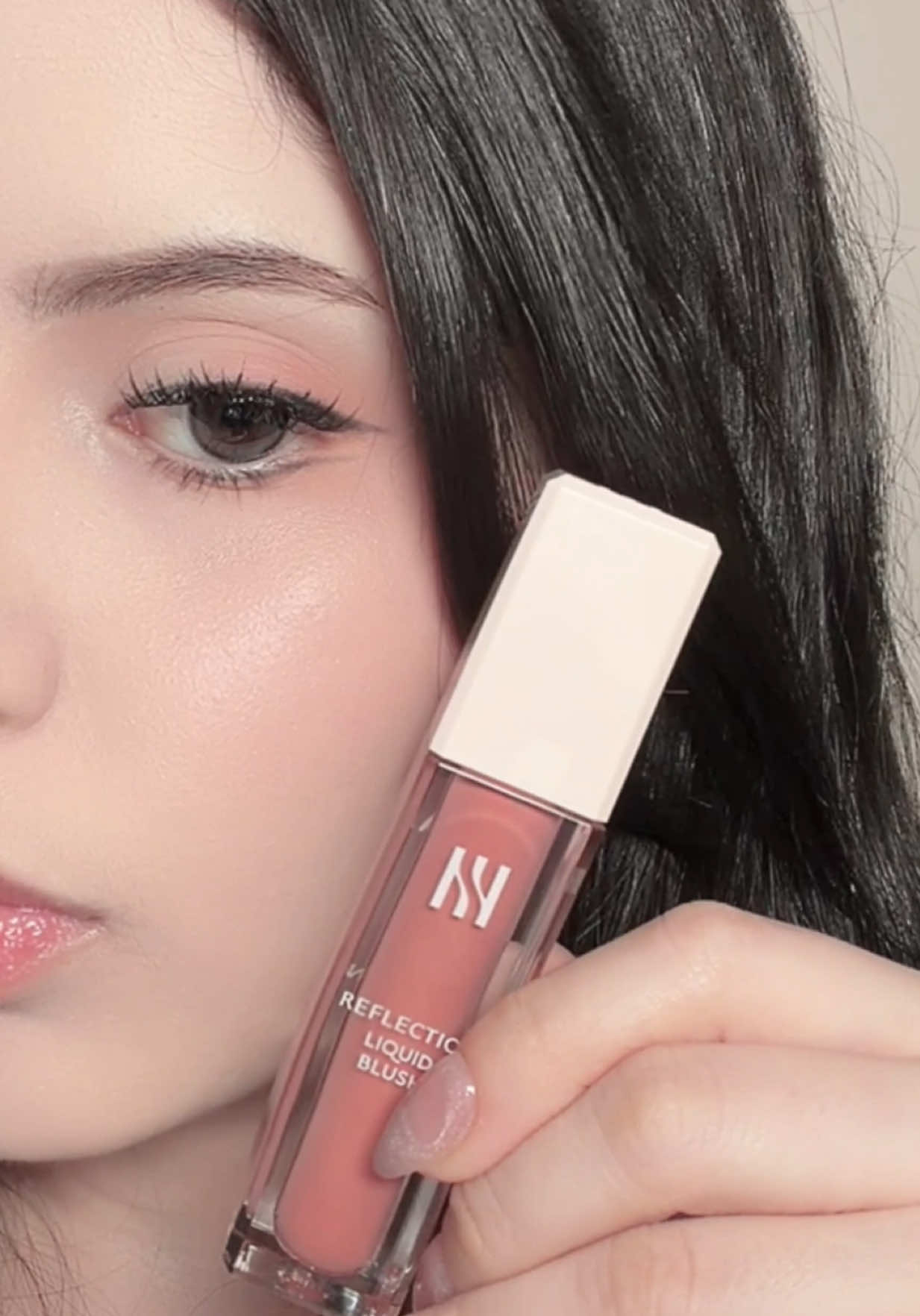 TikTok post by @katie_rosee_ for HERA KR. Caption reads: @HERA @HERA KR #blush #liquidblush #makeup....