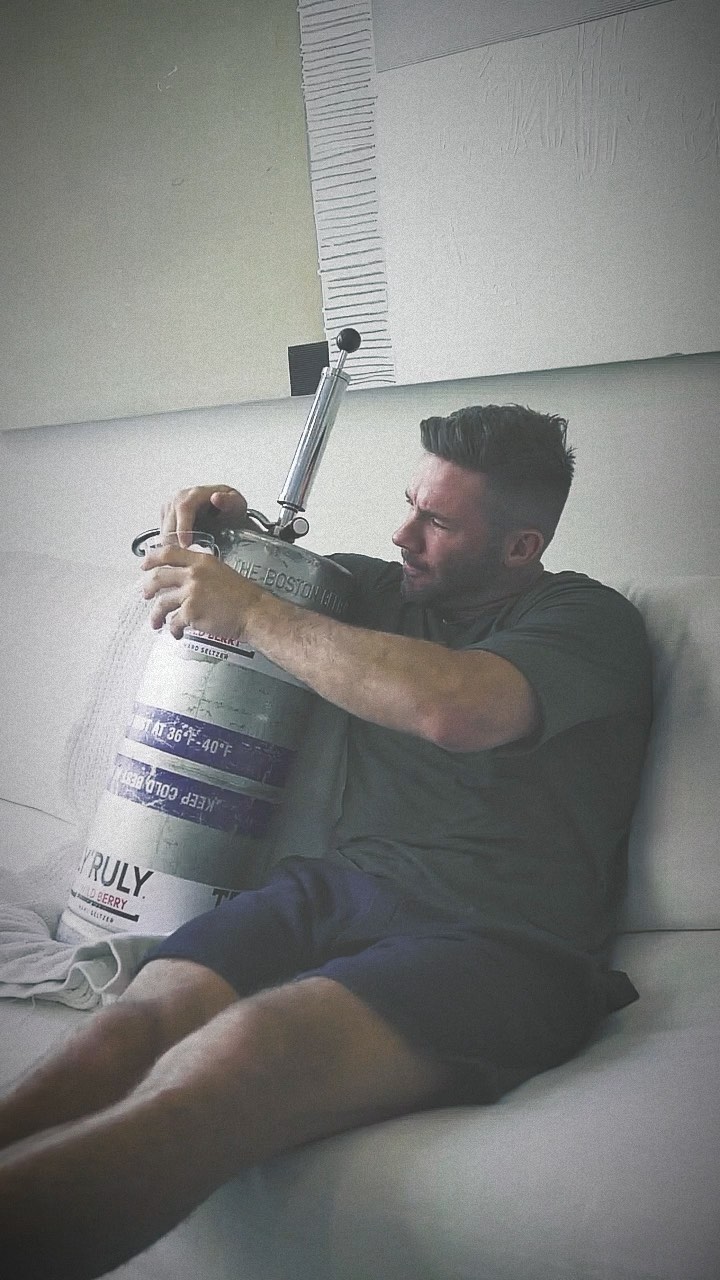 Instagram post by @edelman11 for Truly Hard Seltzer. Caption reads: Monday Night Football 🤝 @truly🤝 My Couch.