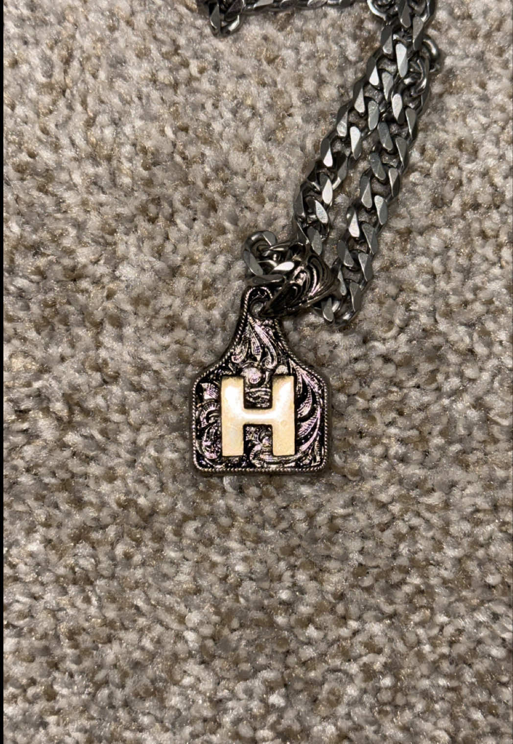 TikTok post by @hunter_bingham for Molly’s Custom Silver. Caption reads: The perfect necklace@Molly's Custom Silver....