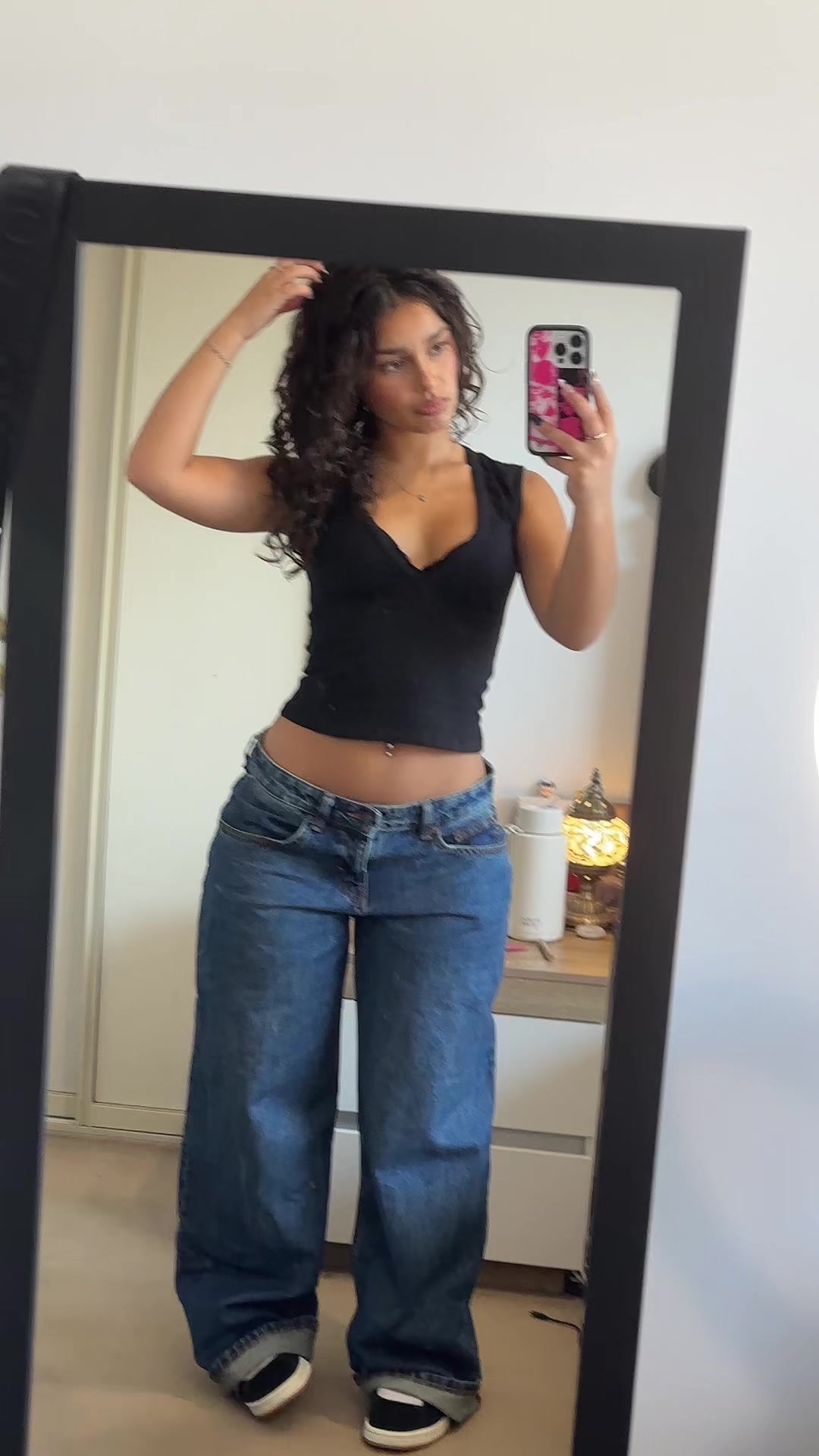 TikTok post by @nataliesmirnakos for Motel Rocks. Caption reads: Feeling confident in my motel rocks perfect pair....