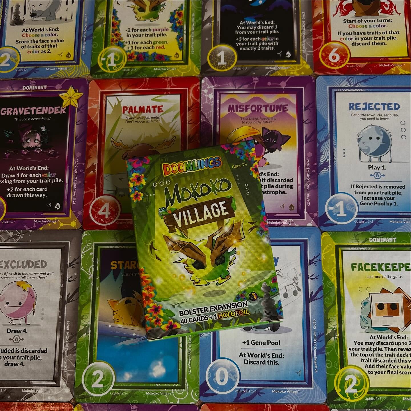 Instagram post by @boardgameduck for Doomlings. Caption reads: REVIEW - Doomlings: Mokoko Village Bolster....