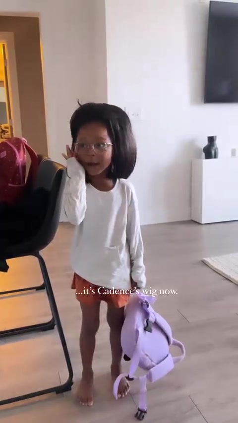 TikTok post by @stehfuhnee_ for Warby Parker. Caption reads: The one time I got a wig and Cadence found it….....