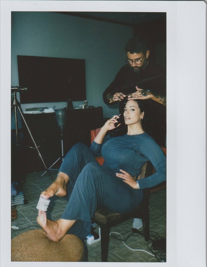 Instagram post by @ashleygraham for Wonderbelly. Caption reads: [...] airplane. kids. repeat. (ft.....