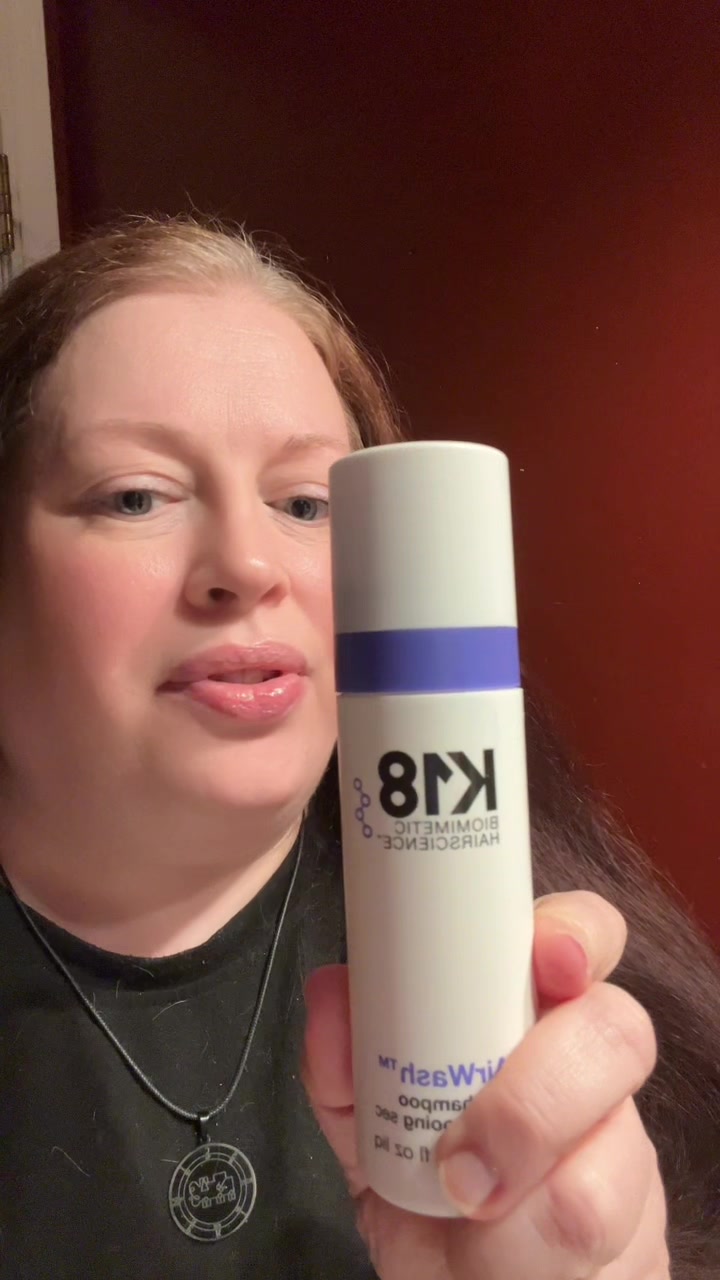 TikTok post by @loricichanowicz for K18 Hair. Caption reads: AirWash dry shampoo. Dry shampoo reduces oil +....