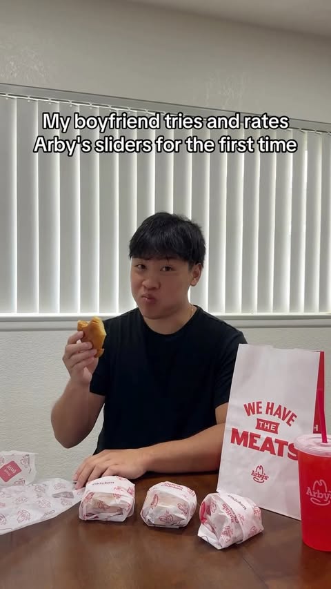 Instagram post by @chelsandkev for Arby's. Caption reads: Which one would you try? @Arbys $1.99 Sliders are....