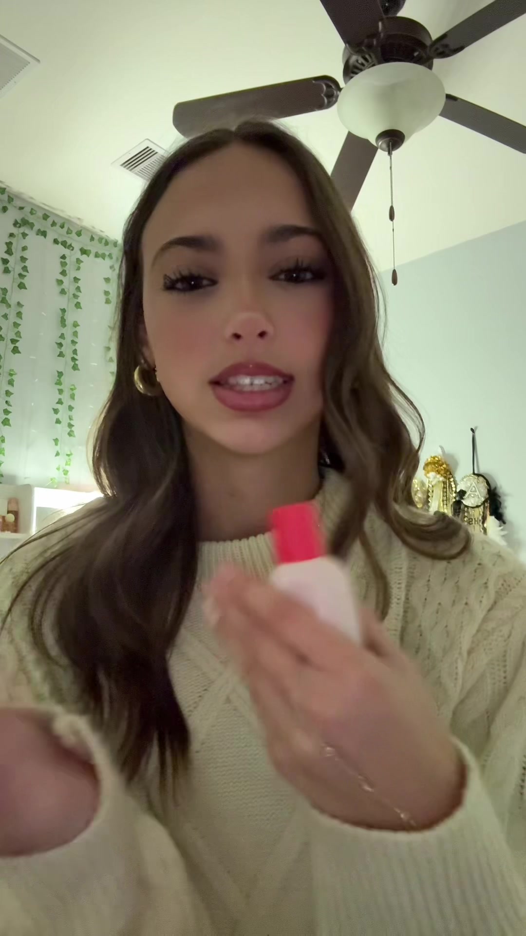 TikTok post by @adelaide_isabella for Glossier. Caption reads: let me put yall onnnn #glossier #glossierperfume....