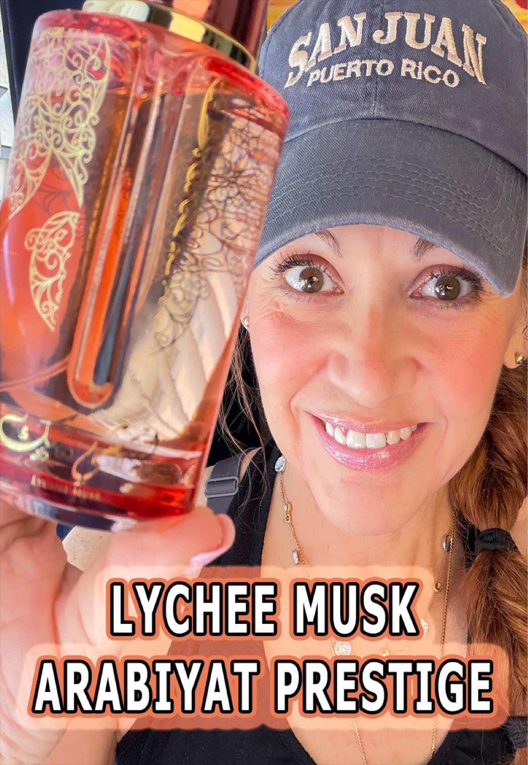 TikTok post by an influencer for American Seair Imports Inc.. Caption reads: Lychee Musk by Arabiyat Prestige is a year-round....