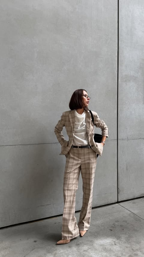 Instagram post by @madina_mariposa for Ann Taylor. Caption reads: [...] so timeless or this easy to style.....