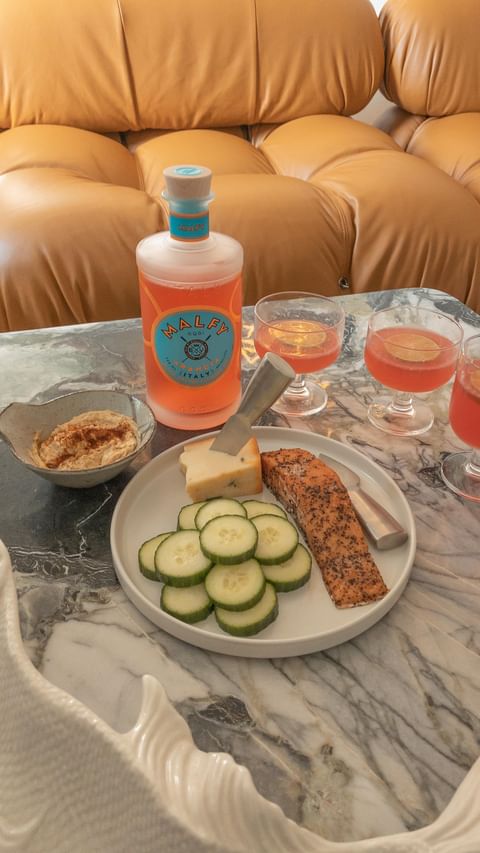Instagram post by @tommy.lei for MALFY Gin. Caption reads: Transporting myself to the Amalfi coast with this....