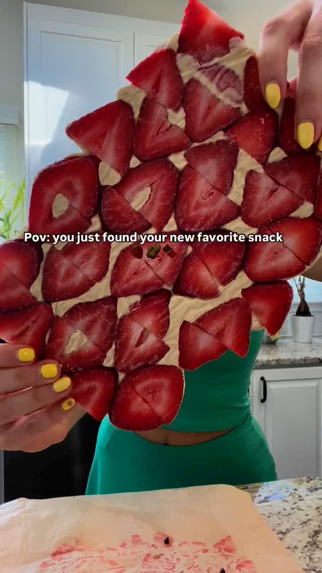 Instagram post by @brit_lumley for EarthChimp. Caption reads: Protein packed strawberry yogurt bark 🥜🍓🍫....