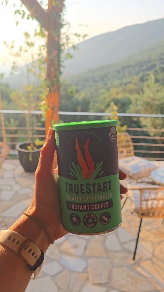Instagram post by @claireztravels for TrueStart Coffee. Caption reads: [AD] Taking my @truestartcoffee on holiday with me....