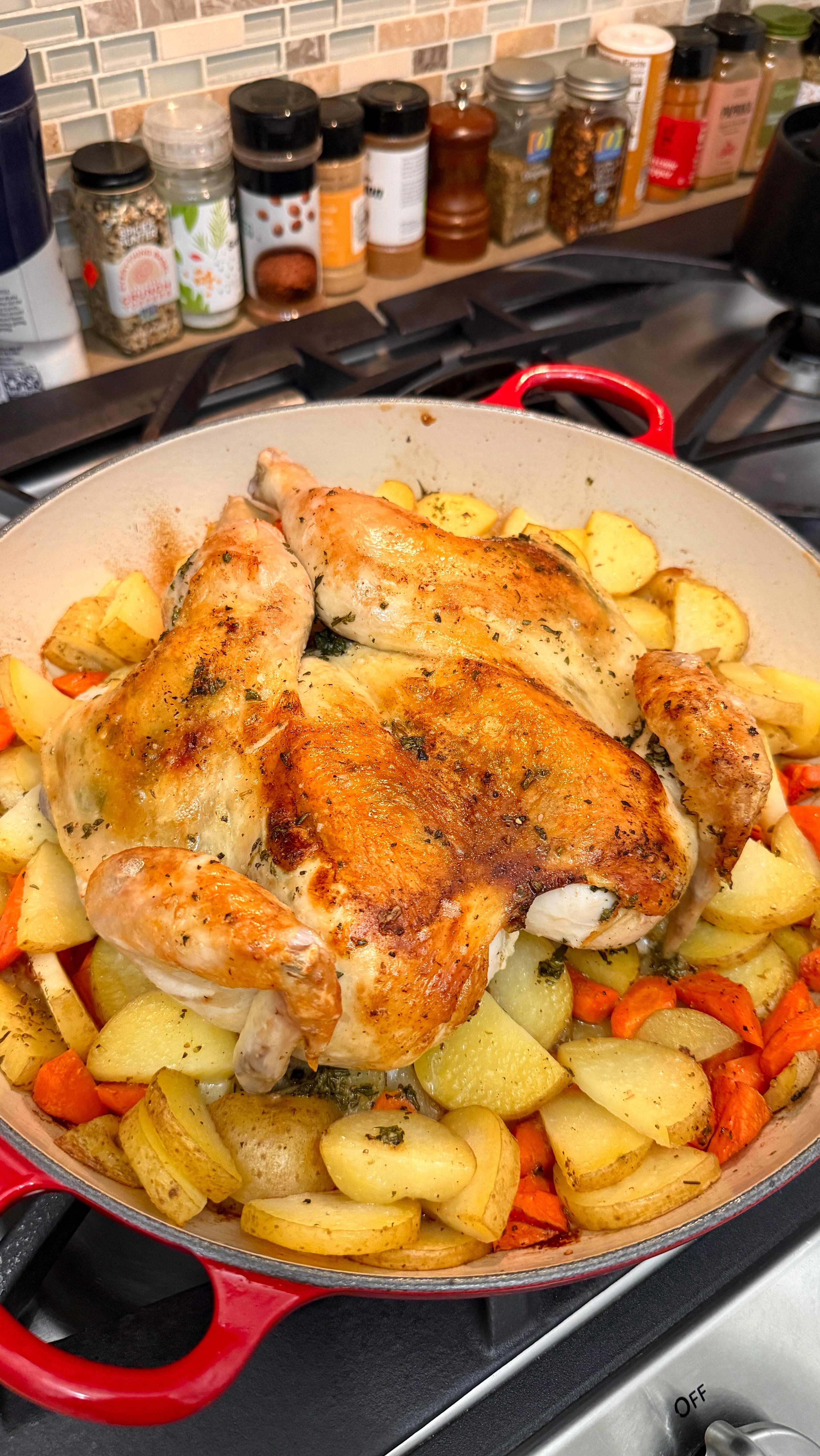 Instagram post by @simpler_eats for Le Creuset. Caption reads: For the first time: spatchcock roast chicken ☺️....