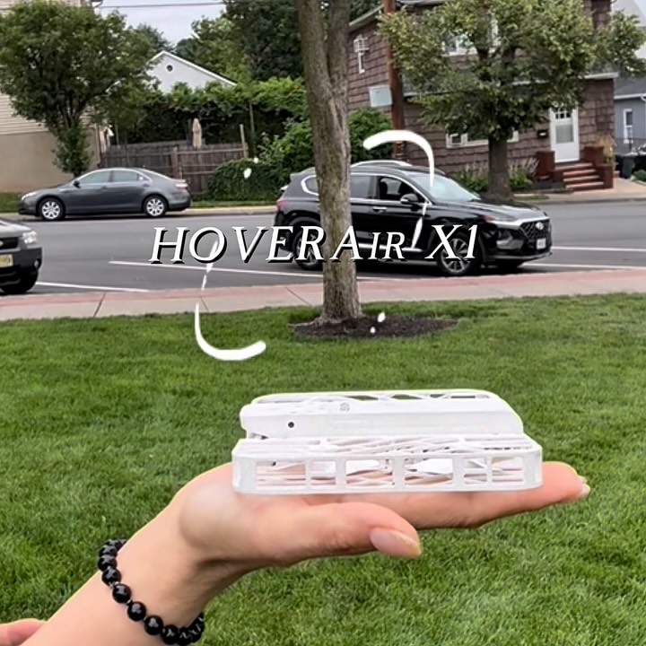 Instagram post by @dharanayogic for Hoverair. Caption reads: Say hello to the HOVERAir X1 the pocket-sized....