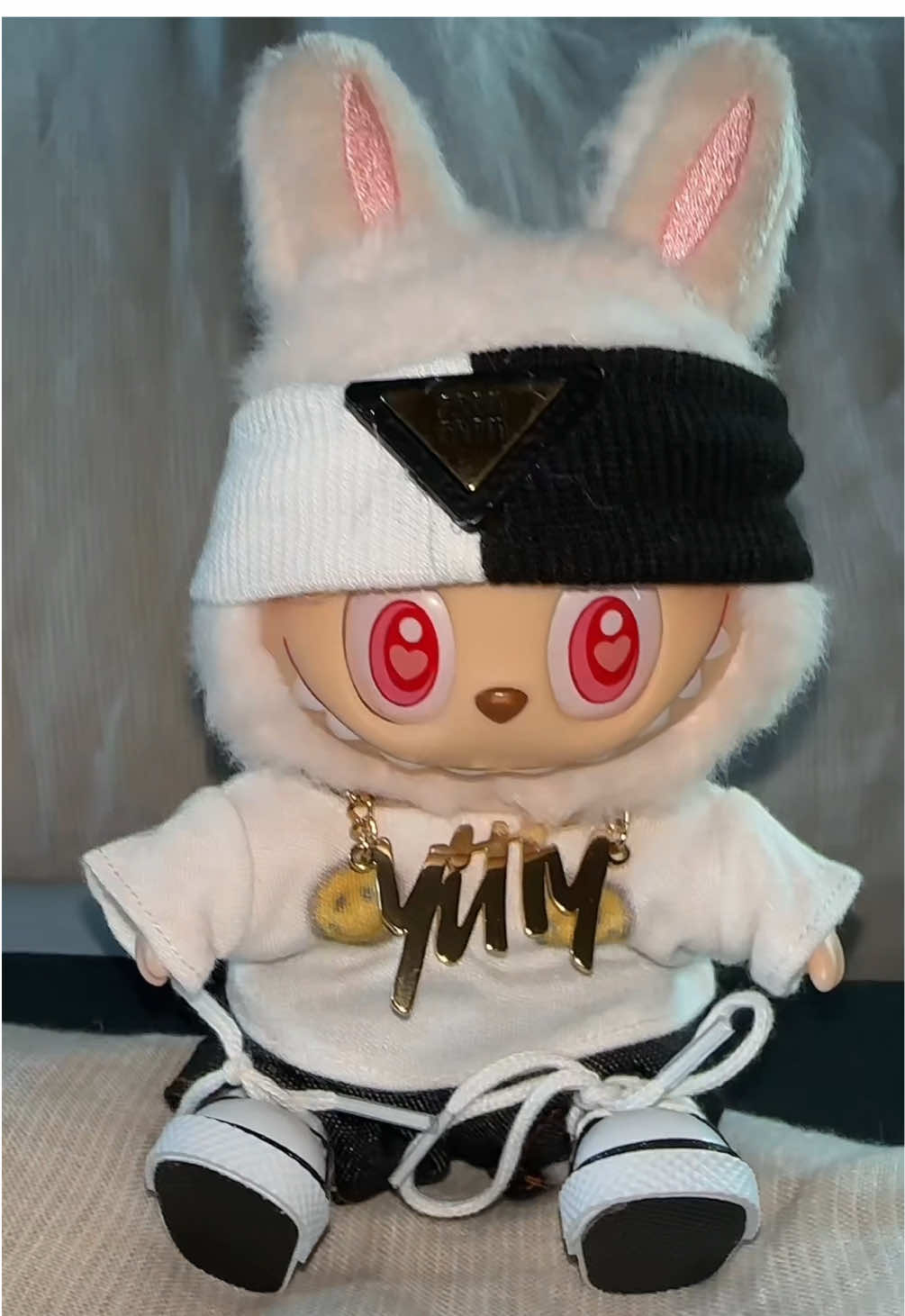 TikTok post by @lizzo for YITTY. Caption reads: Louis tryin out that new @YITTY shapewear no....