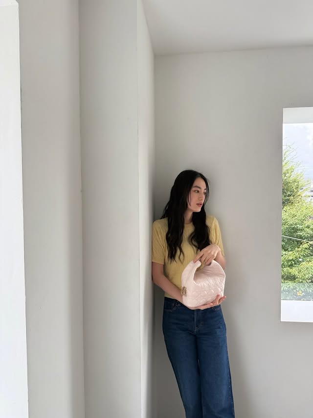 Instagram post by @rikakoyagi_official for Dior. Caption reads: Bag and ring from @dior #supportedbydior, top from....