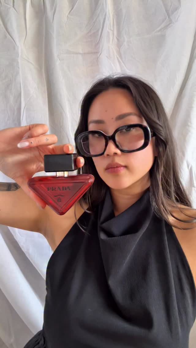 Instagram post by @thelitlist__ for Prada Beauty. Caption reads: An exploration of my creative paradox with Prada....