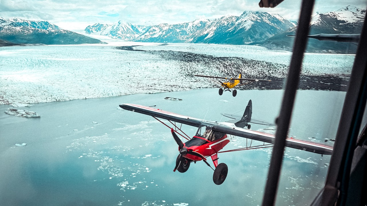 YouTube post by @TrentonPalmer for Garmin. Caption reads: ALASKA - It’s As Good As They Say! Super Cub....