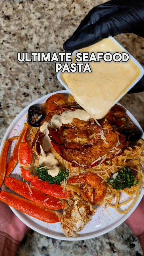 Instagram post by @thee.whiteplate for Anolon. Caption reads: [...] ultimate seafood pasta in my brand new....