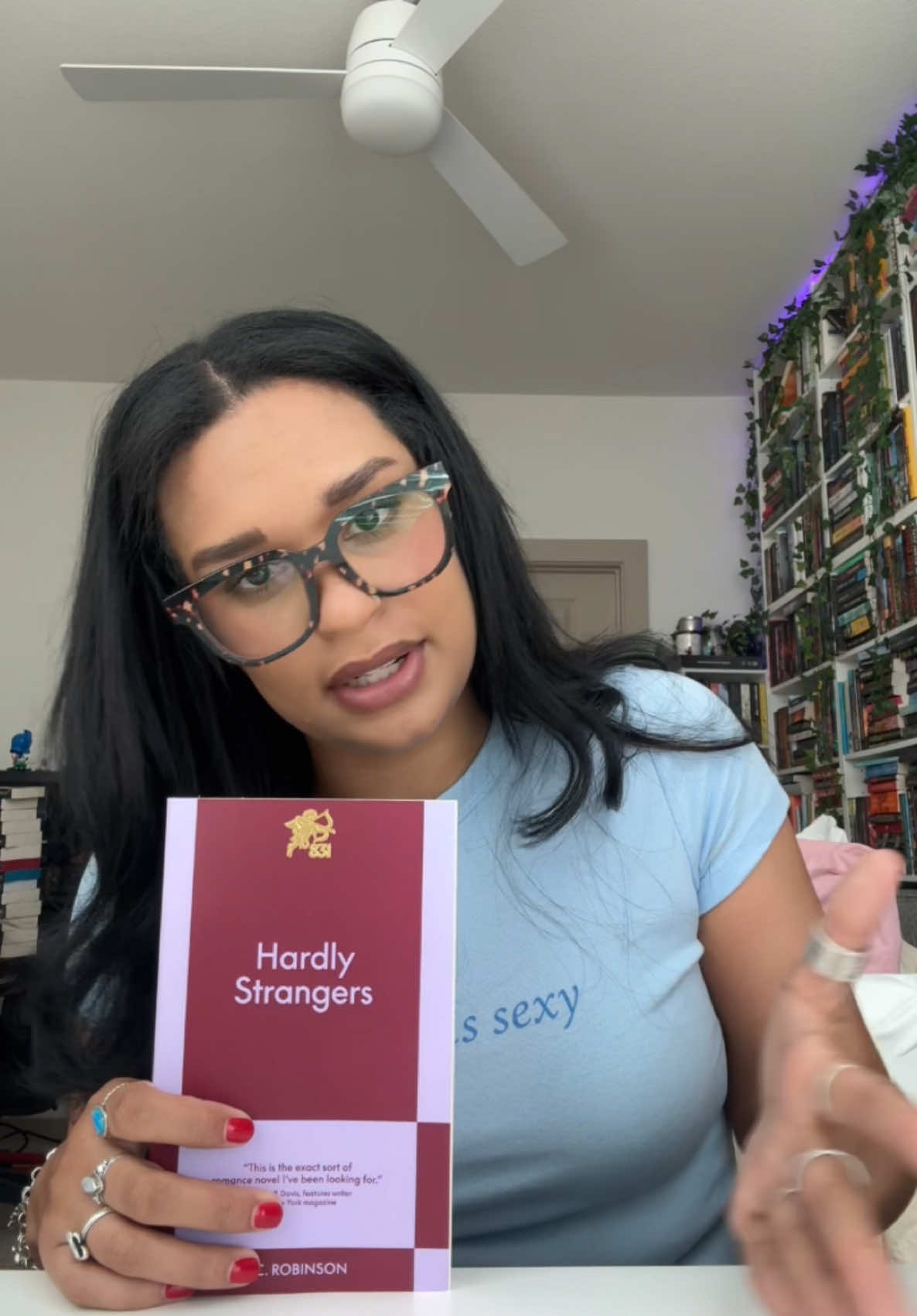 TikTok post by @jolie_reads for 831 Stories. Caption reads: [...] #HardlyStrangers #ACRobinson #831stories....