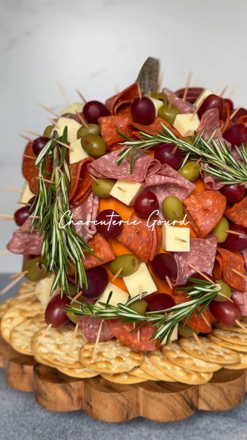 Instagram post by @mombunsandcaffeine for Food Lion. Caption reads: CHARCUTERIE GOURD 🫒🍇

Wash your pumpkin really....