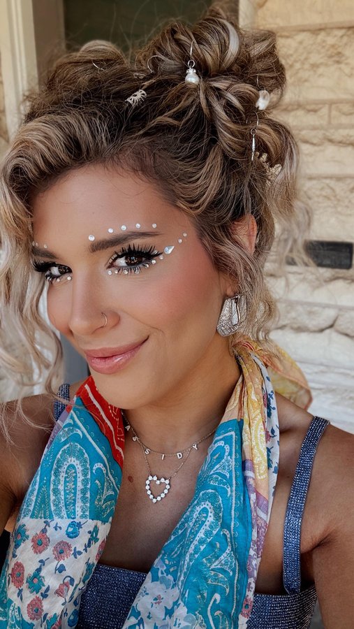 Instagram post by @justclassicallycassidy for Lilly Lashes. Caption reads: Vibrating lip gloss was NOT on my 2025 bingo card…....