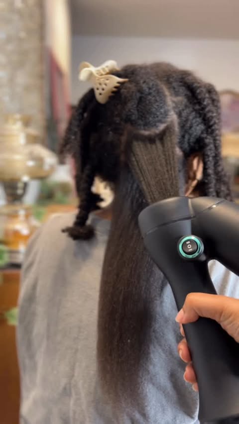 Instagram post by @___moneyb___ for RevAir. Caption reads: I used the @myrevair to stretch my daughter’s hair....