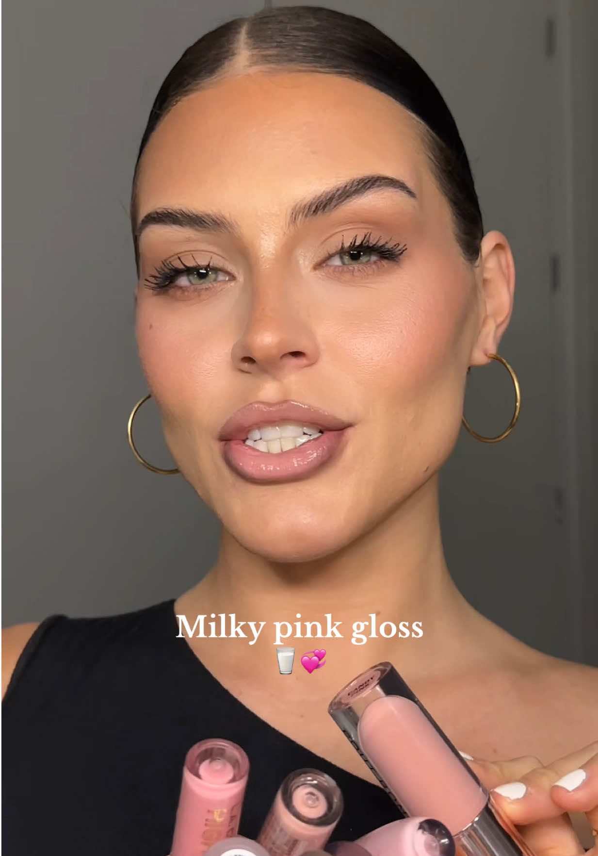 TikTok post by @madisonmkrohn for Makeup Revolution. Caption reads: Another 2000’s baby pink find🤍 has a cooling....