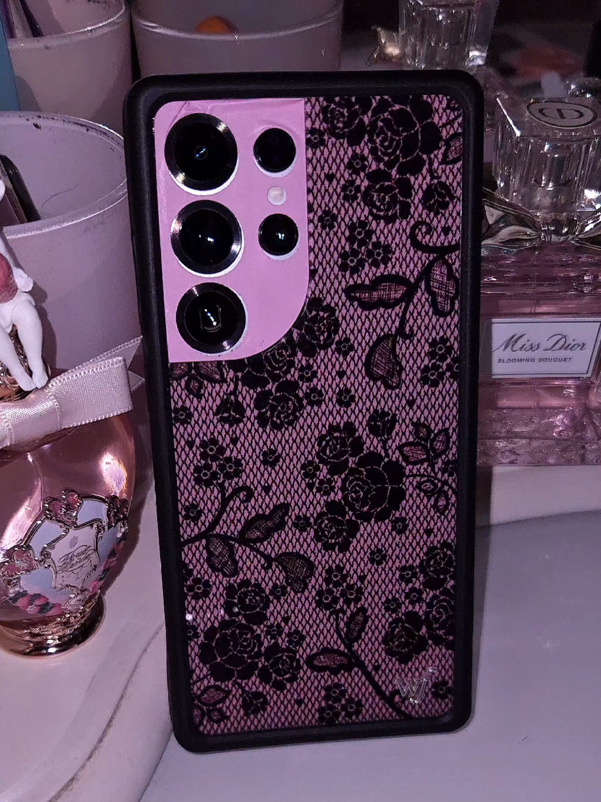 TikTok post by @pinktechgirly for Wildflower Cases. Caption reads: @Wildflower Cases cute pink lace samsung s25 ultra....