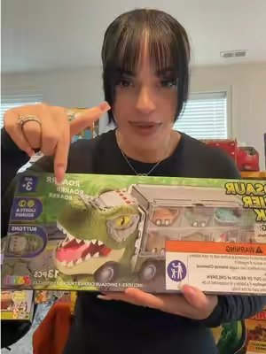 TikTok post by @jasandfern for Joyfy-US. Caption reads: Dinosaur and car lovers RUN!! @JOYIN #toy #toycar....