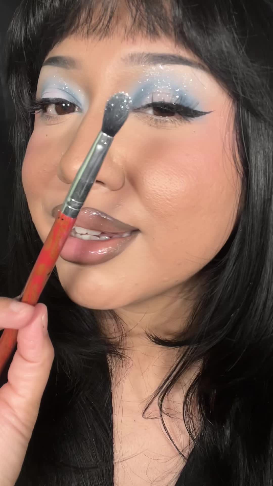 TikTok post by @eveysolorio for SUGAR Cosmetics. Caption reads: Using coconut flakes by @SUGARCOSMETICS ✨ #glitter....