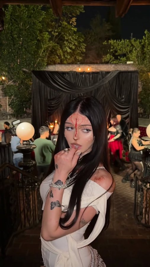 Instagram post by @nevaaadaa for ROMWE. Caption reads: @romwe #ROMWE #ROMWEpartner #ROMWExHalloween....