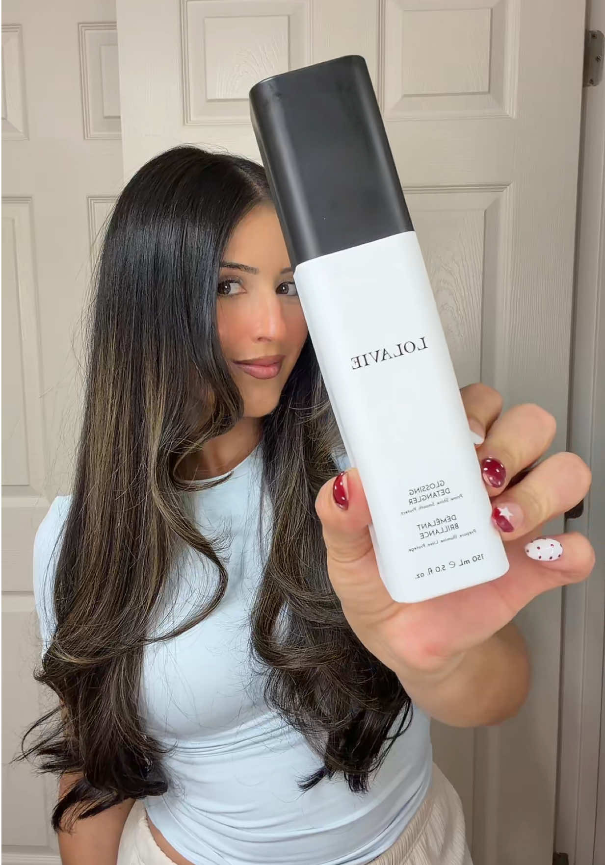 TikTok post by @nigoal_03 for LolaVie. Caption reads: Have you tried @LolaVie ✨ this glossing fetangler....